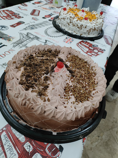 ORIÓN pizzería y pastelería.